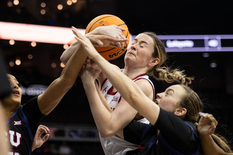 Mar 9, 2024; Kansas City, MO, USA; Oklahoma Sooners guard Payton Verhulst (12) fights for a rebound against Texas Christian Horned Frogs guard Madison Conner (3) during the first half at T-Mobile Center. Mandatory Credit: Amy Kontras-USA TODAY Sports