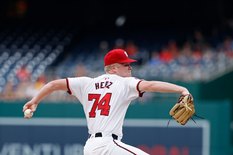 Jul 23, 2024; Washington, District of Columbia, USA; Washington Nationals starting pitcher DJ Herz (74) pitches against the San Diego Padres during the first inning at Nationals Park. Mandatory Credit: Geoff Burke-USA TODAY Sports