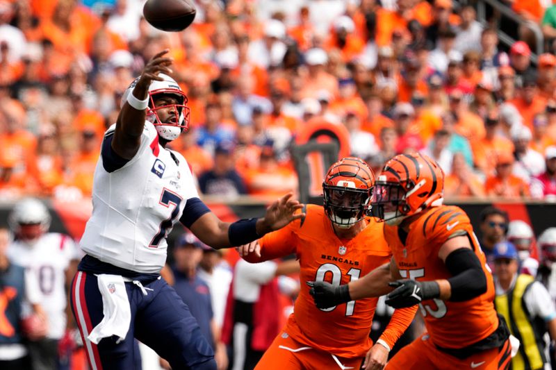 New England Patriots quarterback Jacoby Brissett (7) throws a pass during the first half of an NFL football game against the Cincinnati Bengals, Sunday, Sept. 8, 2024, in Cincinnati. (AP Photo/Jeff Dean)