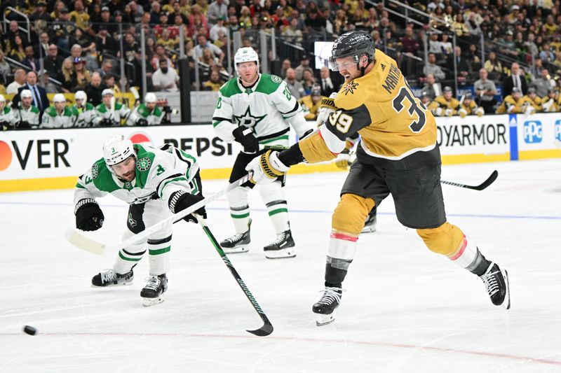 Apr 27, 2024; Las Vegas, Nevada, USA; Vegas Golden Knights right wing Anthony Mantha (39) shoots the puck past Dallas Stars defenseman Chris Tanev (3) in the first period in game three of the first round of the 2024 Stanley Cup Playoffs at T-Mobile Arena. Mandatory Credit: Candice Ward-USA TODAY Sports