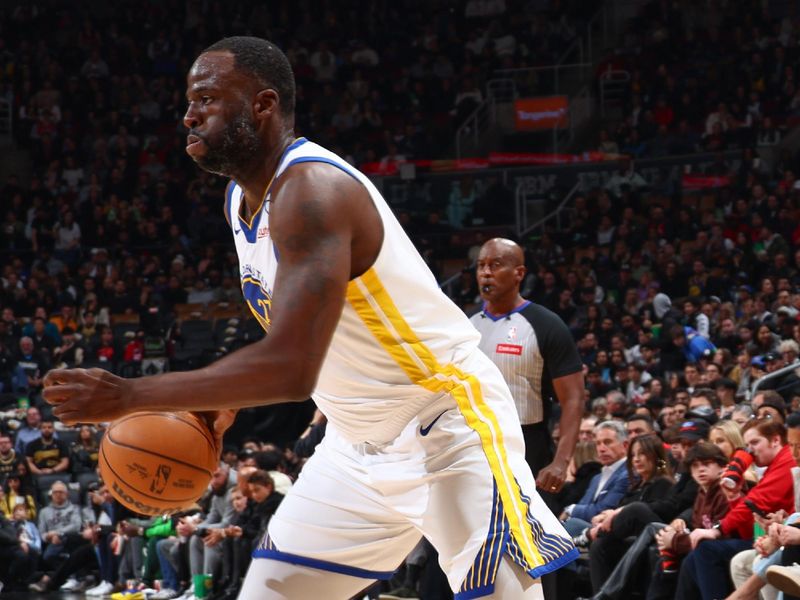 TORONTO, CANADA - MARCH 1:  Draymond Green #23 of the Golden State Warriors handles the ball during the game  on March 1, 2024 at the Scotiabank Arena in Toronto, Ontario, Canada.  NOTE TO USER: User expressly acknowledges and agrees that, by downloading and or using this Photograph, user is consenting to the terms and conditions of the Getty Images License Agreement.  Mandatory Copyright Notice: Copyright 2024 NBAE (Photo by Vaughn Ridley/NBAE via Getty Images)