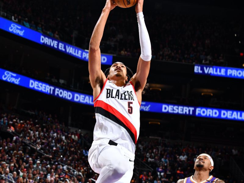 PHOENIX, AZ - NOVEMBER 2: Dalano Banton #5 of the Portland Trail Blazers drives to the basket during the game against the Phoenix Suns on November 2, 2024 at Footprint Center in Phoenix, Arizona. NOTE TO USER: User expressly acknowledges and agrees that, by downloading and or using this photograph, user is consenting to the terms and conditions of the Getty Images License Agreement. Mandatory Copyright Notice: Copyright 2024 NBAE (Photo by Barry Gossage/NBAE via Getty Images)