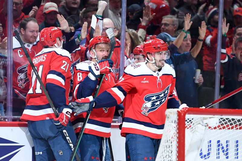 Feb 25, 2026; Washington, District of Columbia, USA; Washington Capitals defenseman Trevor van Riemsdyk (57) celebrates with center Aliaksei Protas (21) and left wing Alex Ovechkin (8) after scoring a goal against the Philadelphia Flyers during the third period at Capital One Arena. Mandatory Credit: Hannah Foslien-Imagn Images