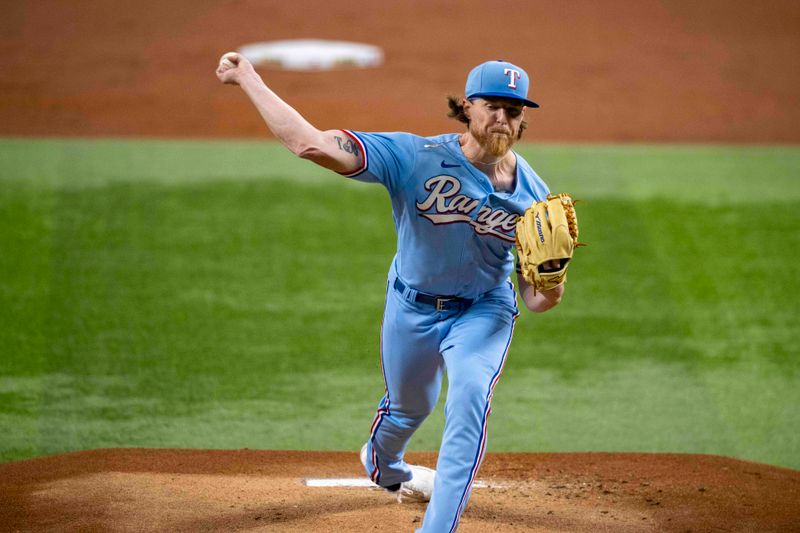 Sep 3, 2023; Arlington, Texas, USA; Texas Rangers starting pitcher Jon Gray (22) pitches against the Minnesota Twins during the first inning at Globe Life Field. Mandatory Credit: Jerome Miron-USA TODAY Sports