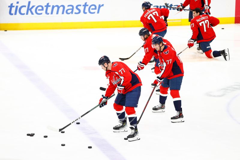 Mar 24, 2024; Washington, District of Columbia, USA; The Washington Capitals player warmup in Washington Capitals right wing T.J. Oshie (not pictured) in honor of Oshie's 1,000th NHL regular-season game prior to their game against the Winnipeg Jets at Capital One Arena. Mandatory Credit: Amber Searls-USA TODAY Sports