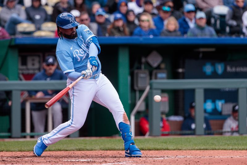 Apr 16, 2023; Kansas City, Missouri, USA; Kansas City Royals right fielder Franmil Reyes (99) at bat during the fifth inning against the Atlanta Braves  at Kauffman Stadium. Mandatory Credit: William Purnell-USA TODAY Sports