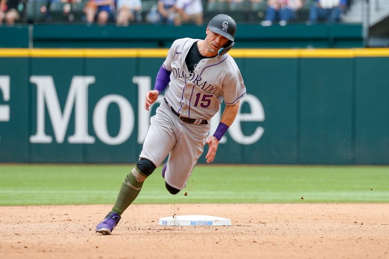 May 21, 2023; Arlington, Texas, USA; Colorado Rockies right fielder Randal Grichuk (15) rounds second base during the eighth inning against the Texas Rangers at Globe Life Field. Mandatory Credit: Andrew Dieb-USA TODAY Sports