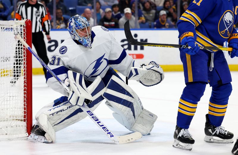 Jan 20, 2024; Buffalo, New York, USA;  Tampa Bay Lightning goaltender Jonas Johansson (31) looks for the puck during the second period against the Buffalo Sabres at KeyBank Center. Mandatory Credit: Timothy T. Ludwig-USA TODAY Sports