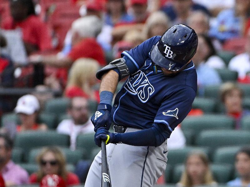Aug 8, 2024; St. Louis, Missouri, USA;  Tampa Bay Rays right fielder Dylan Carlson (10) hits a two run single against the St. Louis Cardinals during the first inning at Busch Stadium. Mandatory Credit: Jeff Curry-USA TODAY Sports