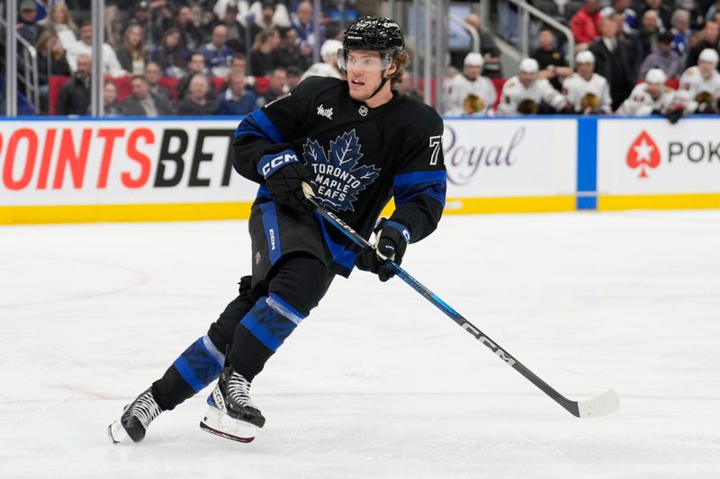 Dec 2, 2024; Toronto, Ontario, CAN; Toronto Maple Leafs forward Nikita Grebenkin (71) skates against the Chicago Blackhawks during the third period at Scotiabank Arena. Mandatory Credit: John E. Sokolowski-Imagn Images