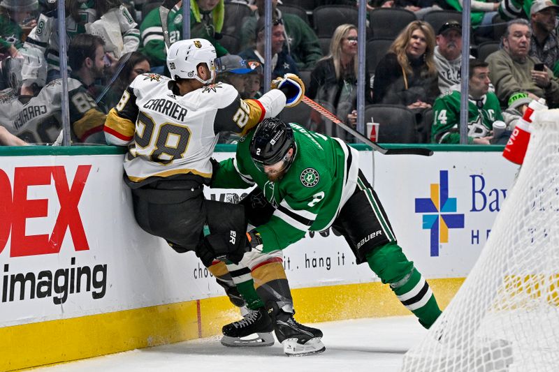 Dec 9, 2023; Dallas, Texas, USA; Dallas Stars defenseman Jani Hakanpaa (2) checks Vegas Golden Knights left wing William Carrier (28) during the third period at the American Airlines Center. Mandatory Credit: Jerome Miron-USA TODAY Sports