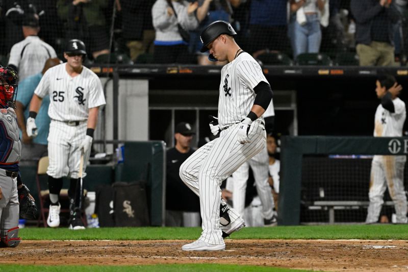 Jun 7, 2024; Chicago, Illinois, USA;  Chicago White Sox outfielder Gavin Sheets (32) steps on home plate after he hits a home run against the Boston Red Sox during the sixth inning at Guaranteed Rate Field. Mandatory Credit: Matt Marton-USA TODAY Sports