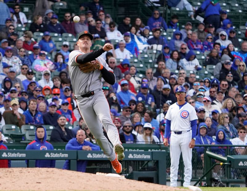 May 7, 2025; Chicago, Illinois, USA; San Francisco Giants third base Matt Chapman (26) throws out Chicago Cubs outfielder Kyle Tucker (not pictured) during the eighth inning at Wrigley Field. Mandatory Credit: David Banks-Imagn Images