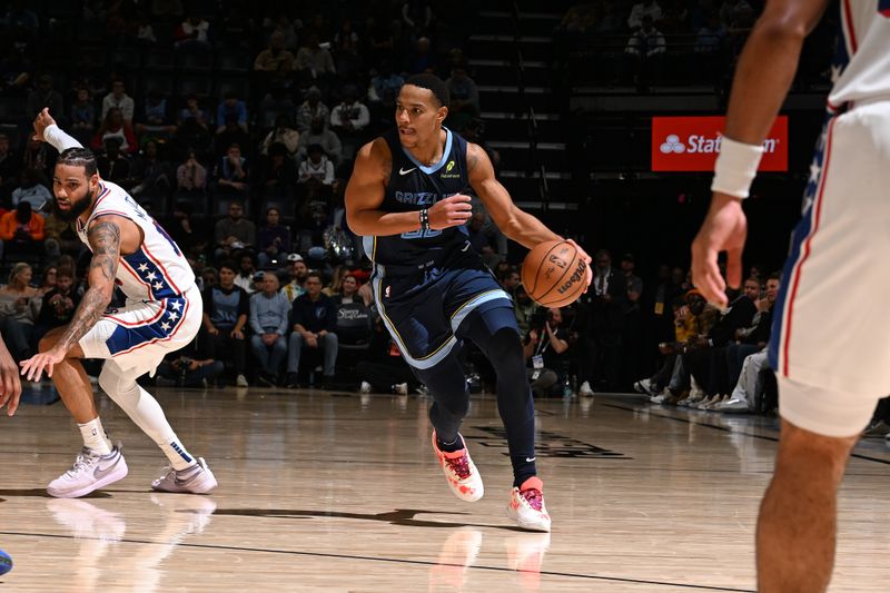 MEMPHIS, TN - NOVEMBER 20: Desmond Bane #22 of the Memphis Grizzlies dribbles the ball during the game against the Philadelphia 76ers on November 20, 2024 at FedExForum in Memphis, Tennessee. NOTE TO USER: User expressly acknowledges and agrees that, by downloading and or using this photograph, User is consenting to the terms and conditions of the Getty Images License Agreement. Mandatory Copyright Notice: Copyright 2024 NBAE (Photo by Grant Burke/NBAE via Getty Images)