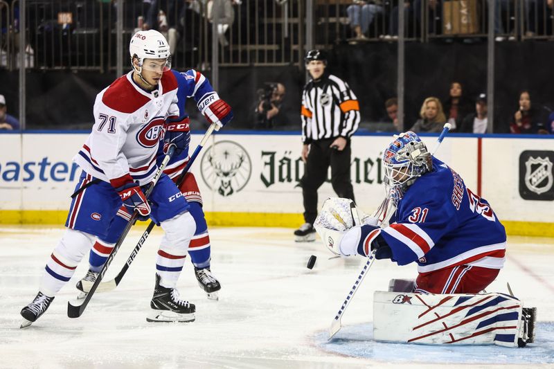 Apr 7, 2024; New York, New York, USA;  New York Rangers goaltender Igor Shesterkin (31) makes a save on a shot on goal attempt by Montreal Canadiens center Jake Evans (71) in the third period at Madison Square Garden. Mandatory Credit: Wendell Cruz-USA TODAY Sports