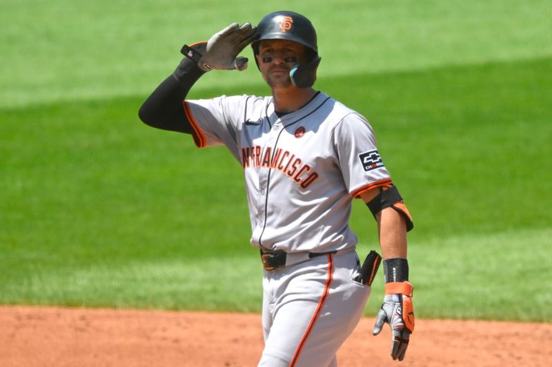 Jul 7, 2024; Cleveland, Ohio, USA; San Francisco Giants shortstop Nick Ahmed (16) celebrates his double in the third inning against the Cleveland Guardians at Progressive Field. Mandatory Credit: David Richard-USA TODAY Sports