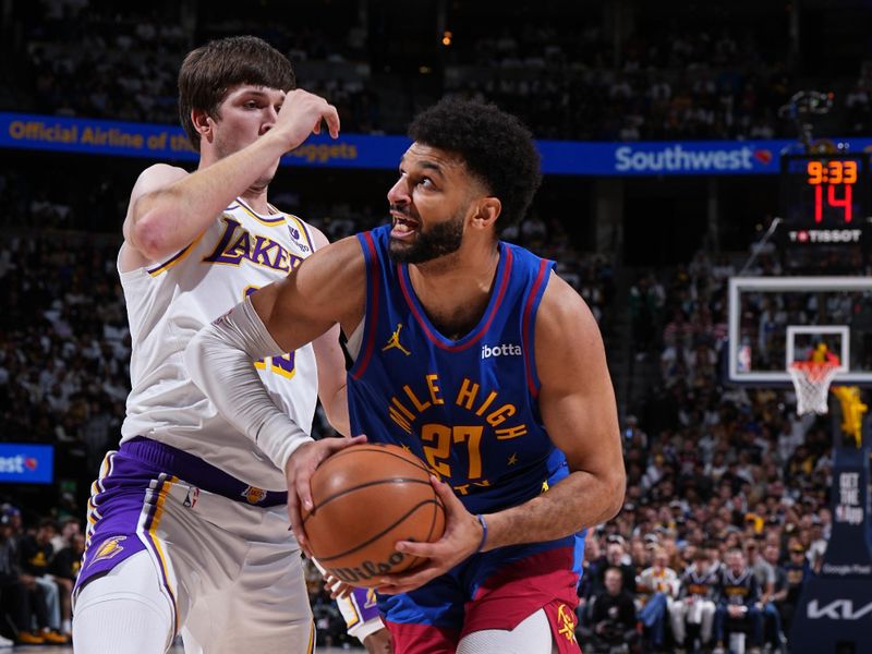 DENVER, CO - APRIL 20: Nikola Jokic #15 of the Denver Nuggets drives to the basket during the game against the Los Angeles Lakers during Round 1 Game 1 of the 2024 NBA Playoffs on April 20, 2024 at the Ball Arena in Denver, Colorado. NOTE TO USER: User expressly acknowledges and agrees that, by downloading and/or using this Photograph, user is consenting to the terms and conditions of the Getty Images License Agreement. Mandatory Copyright Notice: Copyright 2024 NBAE (Photo by Garrett Ellwood/NBAE via Getty Images)