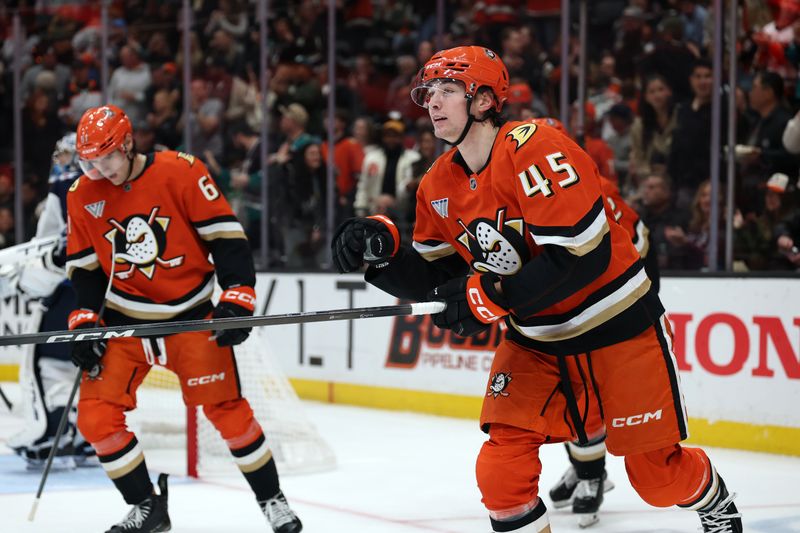 Nov 9, 2025; Anaheim, California, USA;  Anaheim Ducks right wing Beckett Sennecke (45) skates back to the bench after scoring a goal during the second period against the Winnipeg Jets at Honda Center. Mandatory Credit: Kiyoshi Mio-Imagn Images