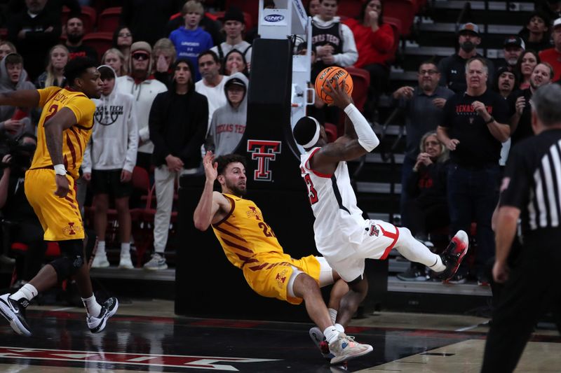 Jan 30, 2023; Lubbock, Texas, USA;  Texas Tech Red Raiders guard De   Vion Harmon (23) is fouled by Iowa State Cyclones guard Gabe Kalscheur (22) in overtime at United Supermarkets Arena. Mandatory Credit: Michael C. Johnson-USA TODAY Sports