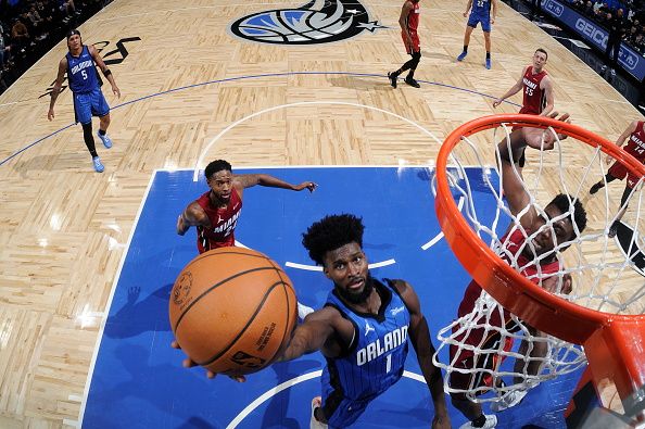 ORLANDO, FL - DECEMBER 20: Jonathan Isaac #1 of the Orlando Magic drives to the basket during the game against the Miami Heat on December 20, 2023 at the Kia Center in Orlando, Florida. NOTE TO USER: User expressly acknowledges and agrees that, by downloading and or using this photograph, User is consenting to the terms and conditions of the Getty Images License Agreement. Mandatory Copyright Notice: Copyright 2023 NBAE (Photo by Fernando Medina/NBAE via Getty Images)