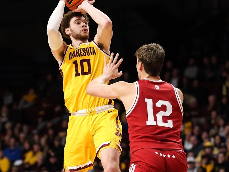 Jan 25, 2023; Minneapolis, Minnesota, USA; Minnesota Golden Gophers forward Jamison Battle (10) shoots while Indiana Hoosiers forward Miller Kopp (12) defends during the first half at Williams Arena. Mandatory Credit: Matt Krohn-USA TODAY Sports