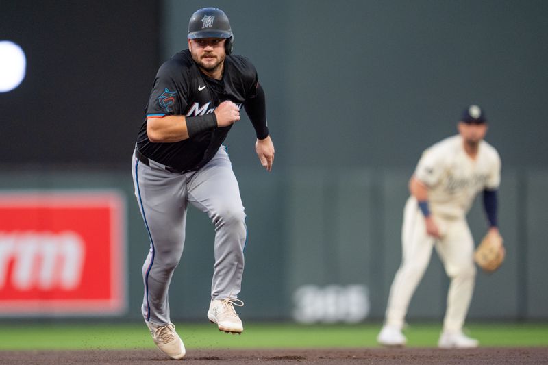 Sep 26, 2024; Minneapolis, Minnesota, USA; Miami Marlins third base Jake Burger (36) runs to third base in the first inning against the Minnesota Twins at Target Field. Mandatory Credit: Matt Blewett-Imagn Images