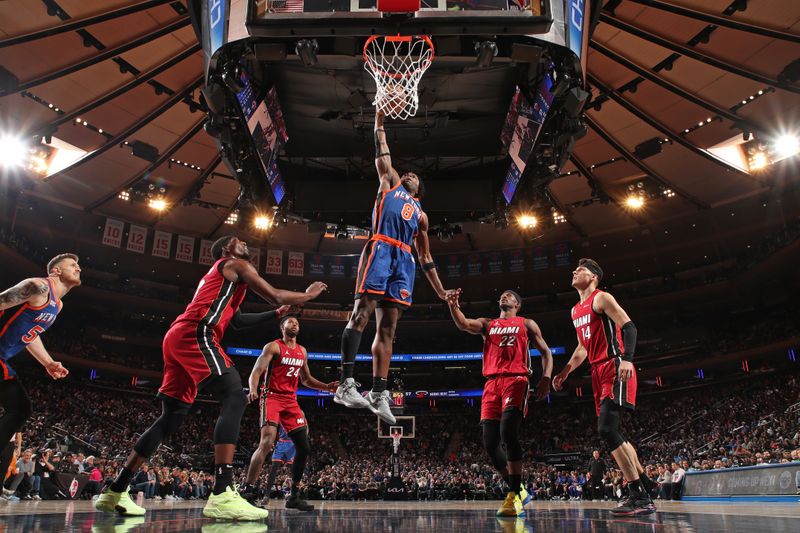 NEW YORK, NY - JANUARY 27: OG Anunoby #8 of the New York Knicks dunks the ball during the game against the Miami Heat on January 27, 2024 at Madison Square Garden in New York City, New York.  NOTE TO USER: User expressly acknowledges and agrees that, by downloading and or using this photograph, User is consenting to the terms and conditions of the Getty Images License Agreement. Mandatory Copyright Notice: Copyright 2024 NBAE  (Photo by Nathaniel S. Butler/NBAE via Getty Images)