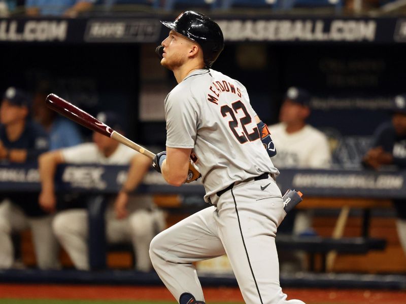 Apr 22, 2024; St. Petersburg, Florida, USA; Detroit Tigers outfielder Parker Meadows (22) hits a home run during the sixth inning against the Tampa Bay Rays at Tropicana Field. Mandatory Credit: Kim Klement Neitzel-USA TODAY Sports