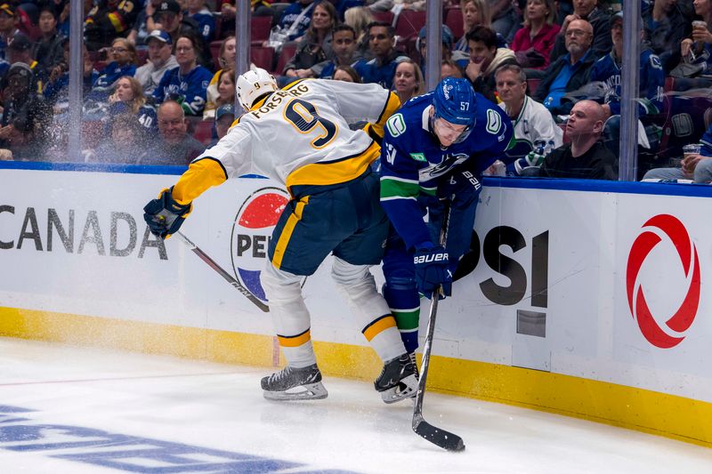 Apr 30, 2024; Vancouver, British Columbia, CAN; Nashville Predators forward Filip Forsberg (9) checks Vancouver Canucks defenseman Tyler Myers (57) during the second period in game five of the first round of the 2024 Stanley Cup Playoffs at Rogers Arena. Mandatory Credit: Bob Frid-USA TODAY Sports