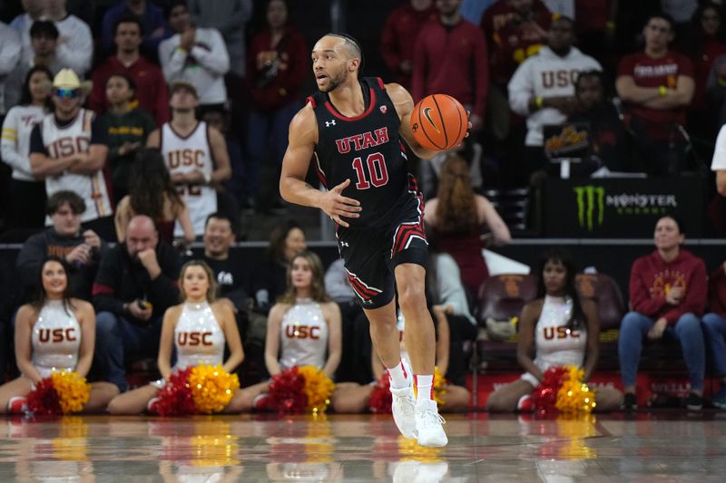 Jan 14, 2023; Los Angeles, California, USA; Utah Utes guard Marco Anthony (10) dribbles the ball against the Southern California Trojans in the first half at Galen Center. Mandatory Credit: Kirby Lee-USA TODAY Sports