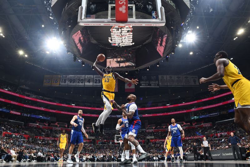 LOS ANGELES, CA - MARCH 25: Pascal Siakam #43 of the Indiana Pacers dunks the ball during the game against the LA Clippers on March 25, 2024 at Crypto.Com Arena in Los Angeles, California. NOTE TO USER: User expressly acknowledges and agrees that, by downloading and/or using this Photograph, user is consenting to the terms and conditions of the Getty Images License Agreement. Mandatory Copyright Notice: Copyright 2024 NBAE (Photo by Adam Pantozzi/NBAE via Getty Images)