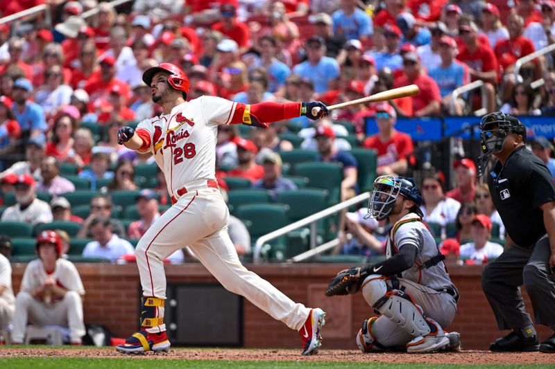 May 6, 2023; St. Louis, Missouri, USA;  St. Louis Cardinals third baseman Nolan Arenado (28) hits a two run home run against the Detroit Tigers during the fifth inning at Busch Stadium. Mandatory Credit: Jeff Curry-USA TODAY Sports