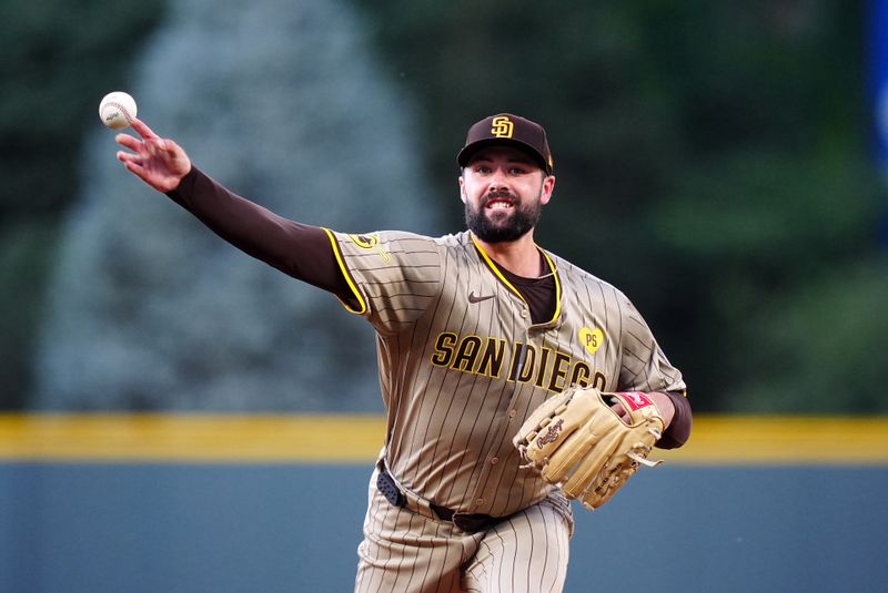 Aug 16, 2024; Denver, Colorado, USA; San Diego Padres starting pitcher Matt Waldron (61) delivers a pitch in the first inning against the Colorado Rockies at Coors Field. Mandatory Credit: Ron Chenoy-USA TODAY Sports