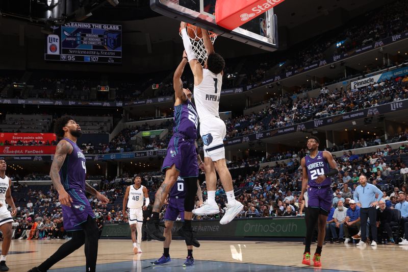 MEMPHIS, TN - MARCH 13: Scotty Pippen Jr. #1 of the Memphis Grizzlies dunks the ball during the game against the Charlotte Hornets on March 13, 2024 at FedExForum in Memphis, Tennessee. NOTE TO USER: User expressly acknowledges and agrees that, by downloading and or using this photograph, User is consenting to the terms and conditions of the Getty Images License Agreement. Mandatory Copyright Notice: Copyright 2024 NBAE (Photo by Joe Murphy/NBAE via Getty Images)