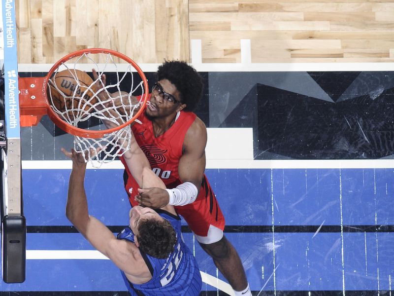 ORLANDO, FL - APRIL 1: Scoot Henderson #00 of the Portland Trail Blazers grabs a rebound during the game against the Orlando Magic on April 1, 2024 at Kia Center in Orlando, Florida. NOTE TO USER: User expressly acknowledges and agrees that, by downloading and or using this photograph, User is consenting to the terms and conditions of the Getty Images License Agreement. Mandatory Copyright Notice: Copyright 2024 NBAE (Photo by Fernando Medina/NBAE via Getty Images)