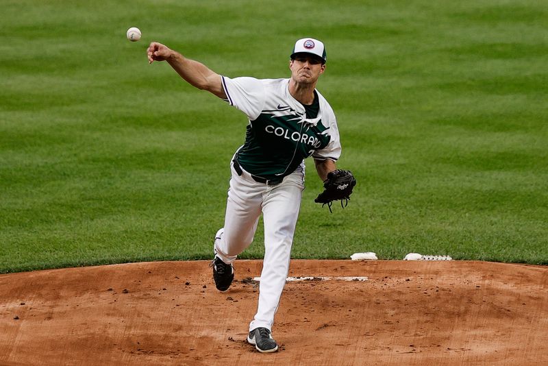 Aug 10, 2024; Denver, Colorado, USA; Colorado Rockies starting pitcher Dakota Hudson (32) pitches in the first inning against the Atlanta Braves at Coors Field. Mandatory Credit: Isaiah J. Downing-USA TODAY Sports