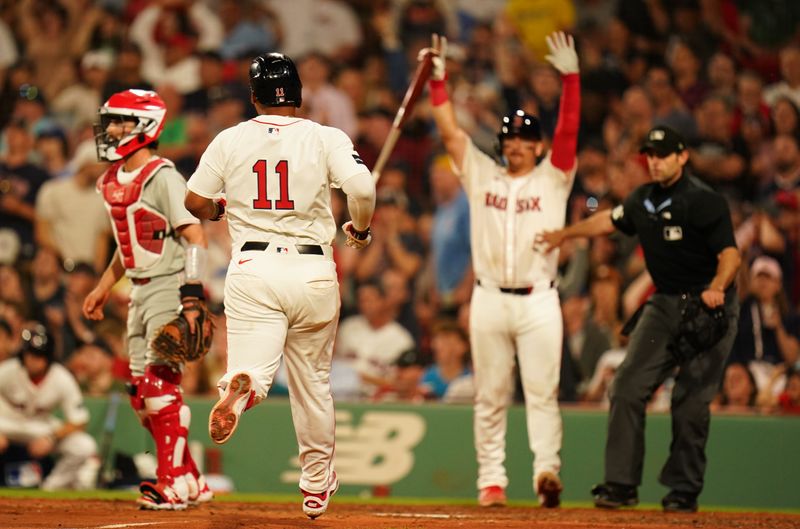 Jun 13, 2024; Boston, Massachusetts, USA; Boston Red Sox third baseman Rafael Devers (11) scores against the Philadelphia Phillies in the sixth inning at Fenway Park. Mandatory Credit: David Butler II-USA TODAY Sports