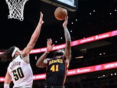 ATLANTA, GA - DECEMBER 11: Saddiq Bey #41 of the Atlanta Hawks shoots the ball during the game against the Denver Nuggets on December 11, 2023 at State Farm Arena in Atlanta, Georgia.  NOTE TO USER: User expressly acknowledges and agrees that, by downloading and/or using this Photograph, user is consenting to the terms and conditions of the Getty Images License Agreement. Mandatory Copyright Notice: Copyright 2023 NBAE (Photo by Adam Hagy/NBAE via Getty Images)