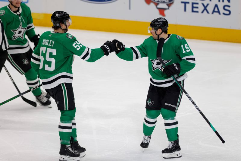 Mar 16, 2024; Dallas, Texas, USA; Dallas Stars defenseman Thomas Harley (55) congratulates center Craig Smith (15) after Smith scores a goal against the Los Angeles Kings during the first period at American Airlines Center. Mandatory Credit: Andrew Dieb-USA TODAY Sports