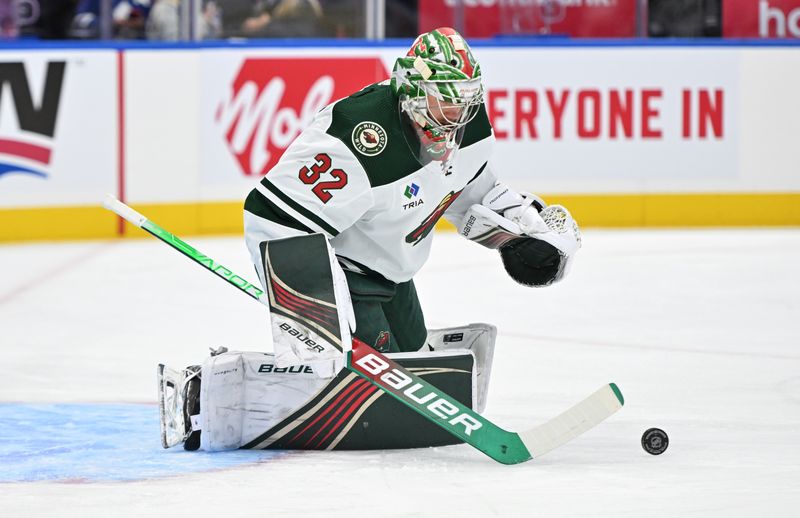 Oct 14, 2023; Toronto, Ontario, CAN;   Minnesota Wild goalie Filip Gustavsson (32) warms up before playing the Toronto Maple Leafs at Scotiabank Arena. Mandatory Credit: Dan Hamilton-USA TODAY Sports