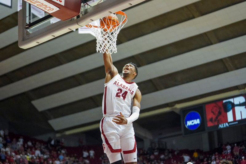 Feb 8, 2023; Tuscaloosa, Alabama, USA; Alabama Crimson Tide forward Brandon Miller (24) goes to the basket against the Florida Gators during the second half at Coleman Coliseum. Mandatory Credit: Marvin Gentry-USA TODAY Sports