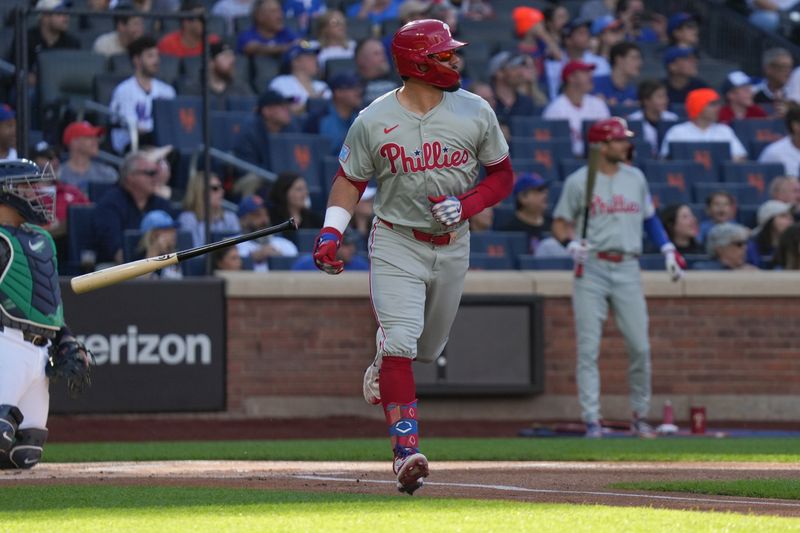 Sep 21, 2024; New York City, New York, USA; Philadelphia Phillies designated hitter Kyle Schwarber (12) hits a home run during the first inning against the New York Mets at Citi Field. Mandatory Credit: Lucas Boland-Imagn Images