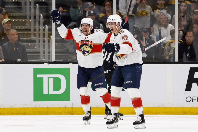 May 10, 2024; Boston, Massachusetts, USA; Florida Panthers center Evan Rodrigues (17) (left) celebrates his goal against the Boston Bruins with center Anton Lundell (15) during the first period of game three of the second round of the 2024 Stanley Cup Playoffs at TD Garden. Mandatory Credit: Winslow Townson-USA TODAY Sports