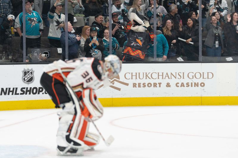 Feb 29, 2024; San Jose, California, USA; San Jose Sharks mascot SJ Sharkie celebrates with fans as Anaheim Ducks goaltender John Gibson (36) reacts during the second period at SAP Center at San Jose. Mandatory Credit: Stan Szeto-USA TODAY Sports