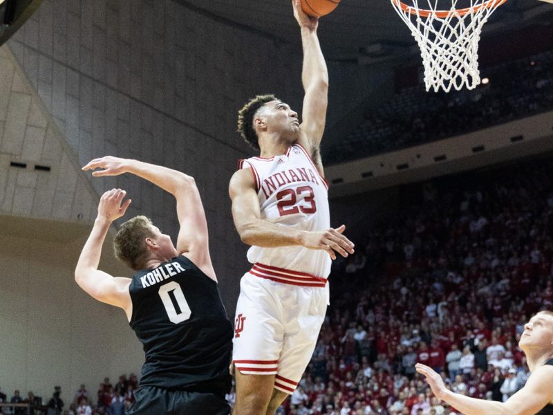 Jan 22, 2023; Bloomington, Indiana, USA; Indiana Hoosiers forward Trayce Jackson-Davis (23) shoots the ball while Michigan State Spartans forward Jaxon Kohler (0) defends in the first half at Simon Skjodt Assembly Hall. Mandatory Credit: Trevor Ruszkowski-USA TODAY Sports