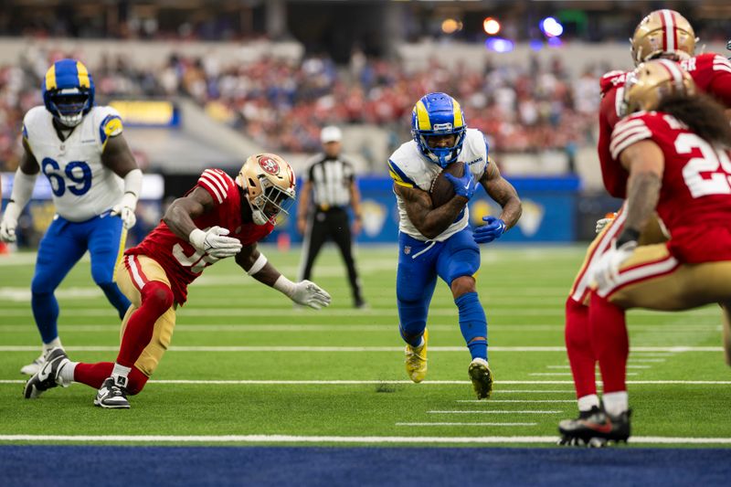 Los Angeles Rams running back Kyren Williams (23) runs with the ball for a touchdown during an NFL football game against the San Francisco 49ers, Sunday, Sept. 22, 2024, in Inglewood, Calif. (AP Photo/Kyusung Gong)