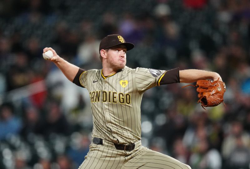 Apr 23, 2024; Denver, Colorado, USA; San Diego Padres relief pitcher Stephen Kolek (32) delivers a pitch in the fourth inning against the Colorado Rockies at Coors Field. Mandatory Credit: Ron Chenoy-USA TODAY Sports