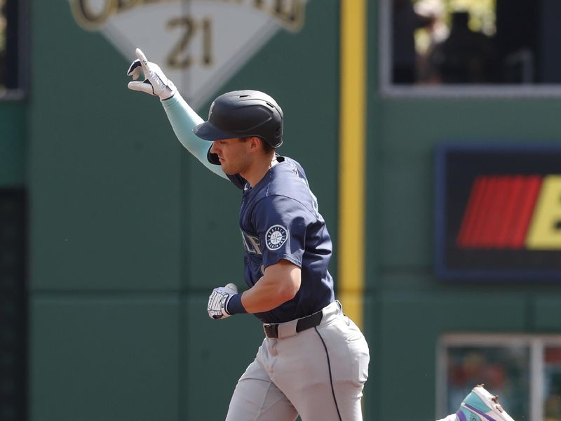 Aug 18, 2024; Pittsburgh, Pennsylvania, USA;  Seattle Mariners right fielder Dominic Canzone (8) circles the bases on a solo home run against the Pittsburgh Pirates during the fifth inning at PNC Park. Mandatory Credit: Charles LeClaire-USA TODAY Sports