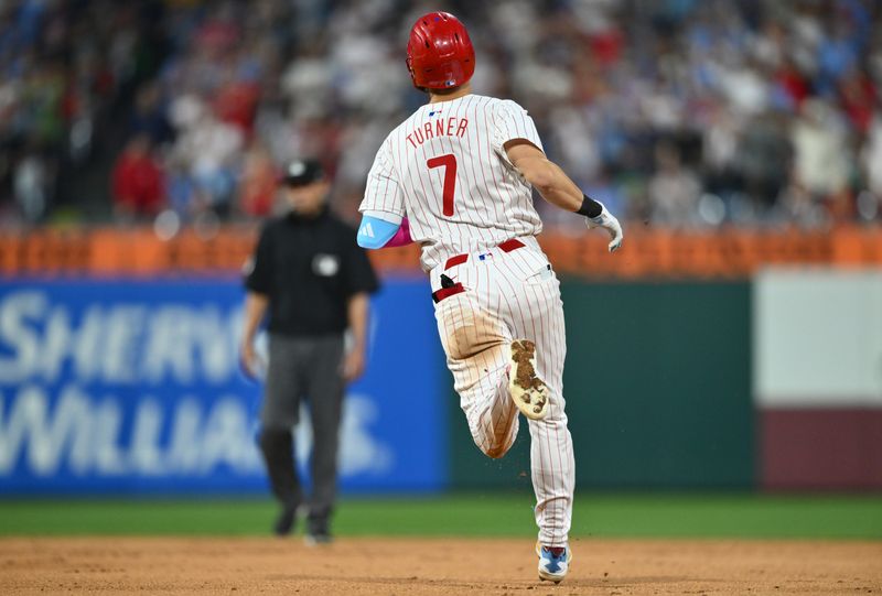 Aug 17, 2024; Philadelphia, Pennsylvania, USA; Philadelphia Phillies shortstop Trea Turner (7) runs toward second after hitting a double against the Washington Nationals in the sixth inning at Citizens Bank Park. Mandatory Credit: Kyle Ross-USA TODAY Sports