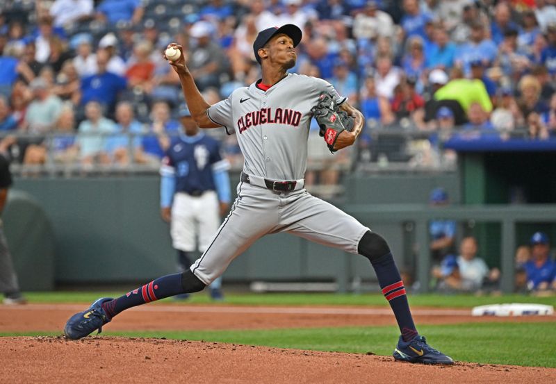 Jun 28, 2024; Kansas City, Missouri, USA;  Cleveland Guardians starting pitcher Triston McKenzie (24) delivers a pitch in the first inning against the Kansas City Royals at Kauffman Stadium. Mandatory Credit: Peter Aiken-USA TODAY Sports